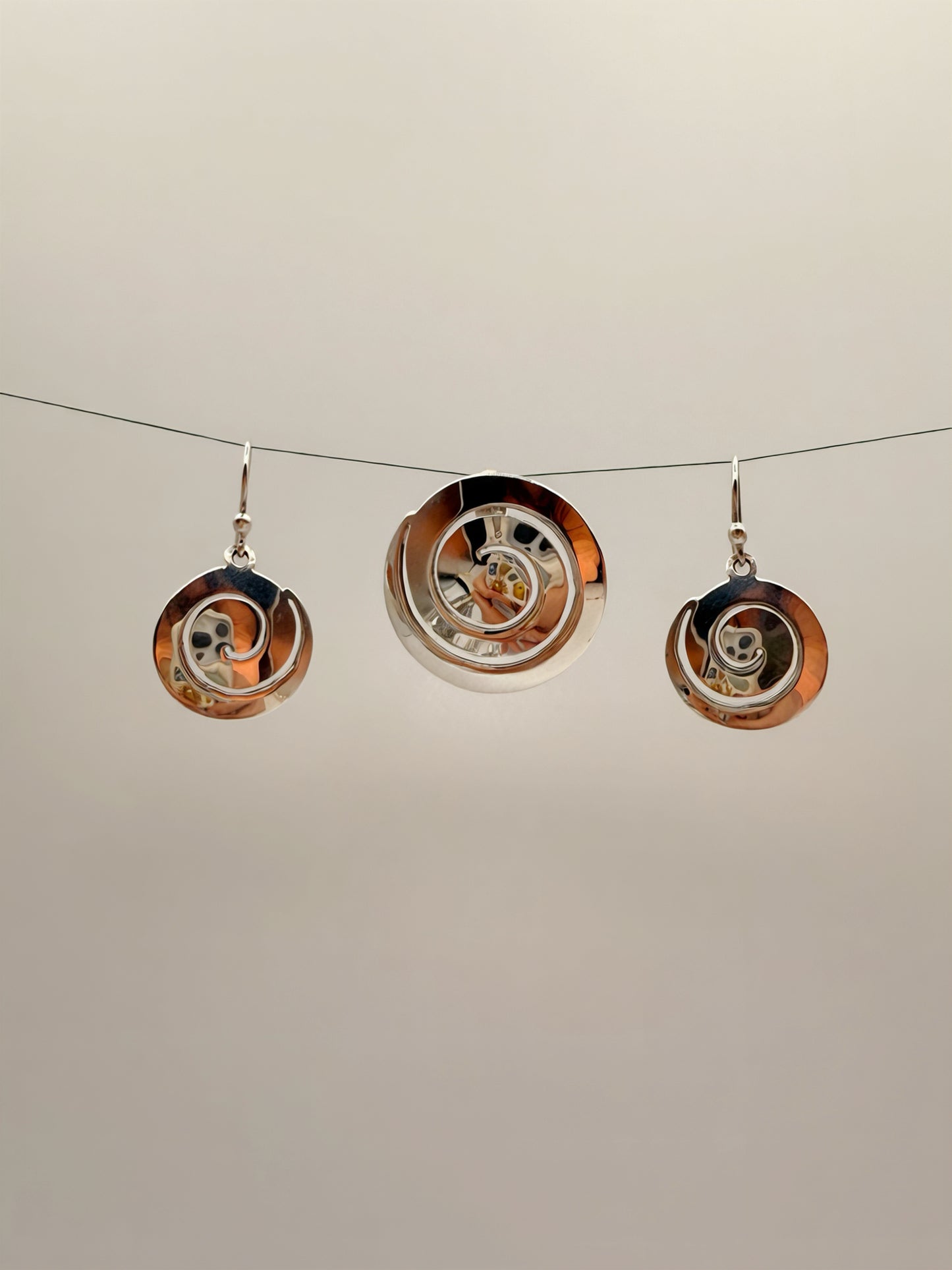 Hypnosis Earrings and Pendant Set