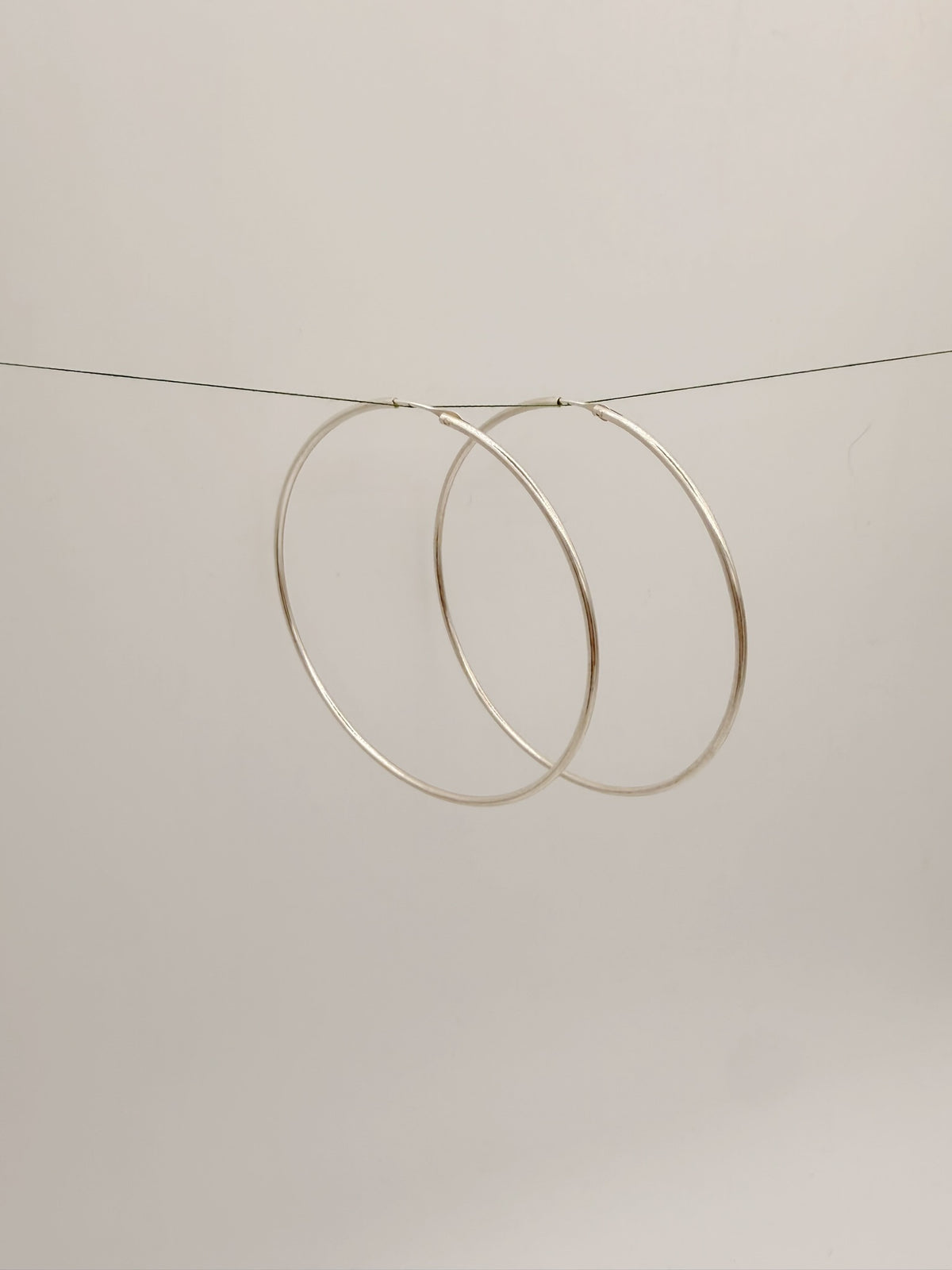 Ultra Thin Loop Infinity Hoops